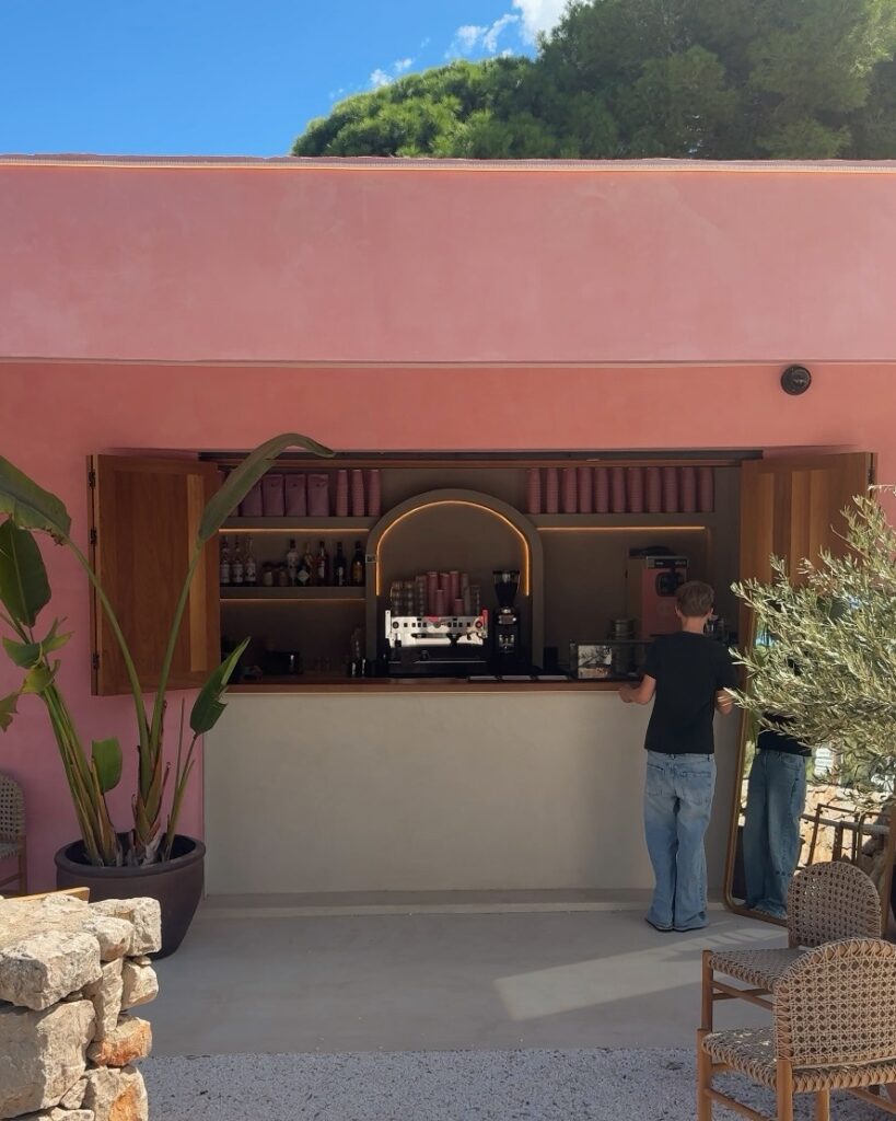Stoop Café pink building and bar