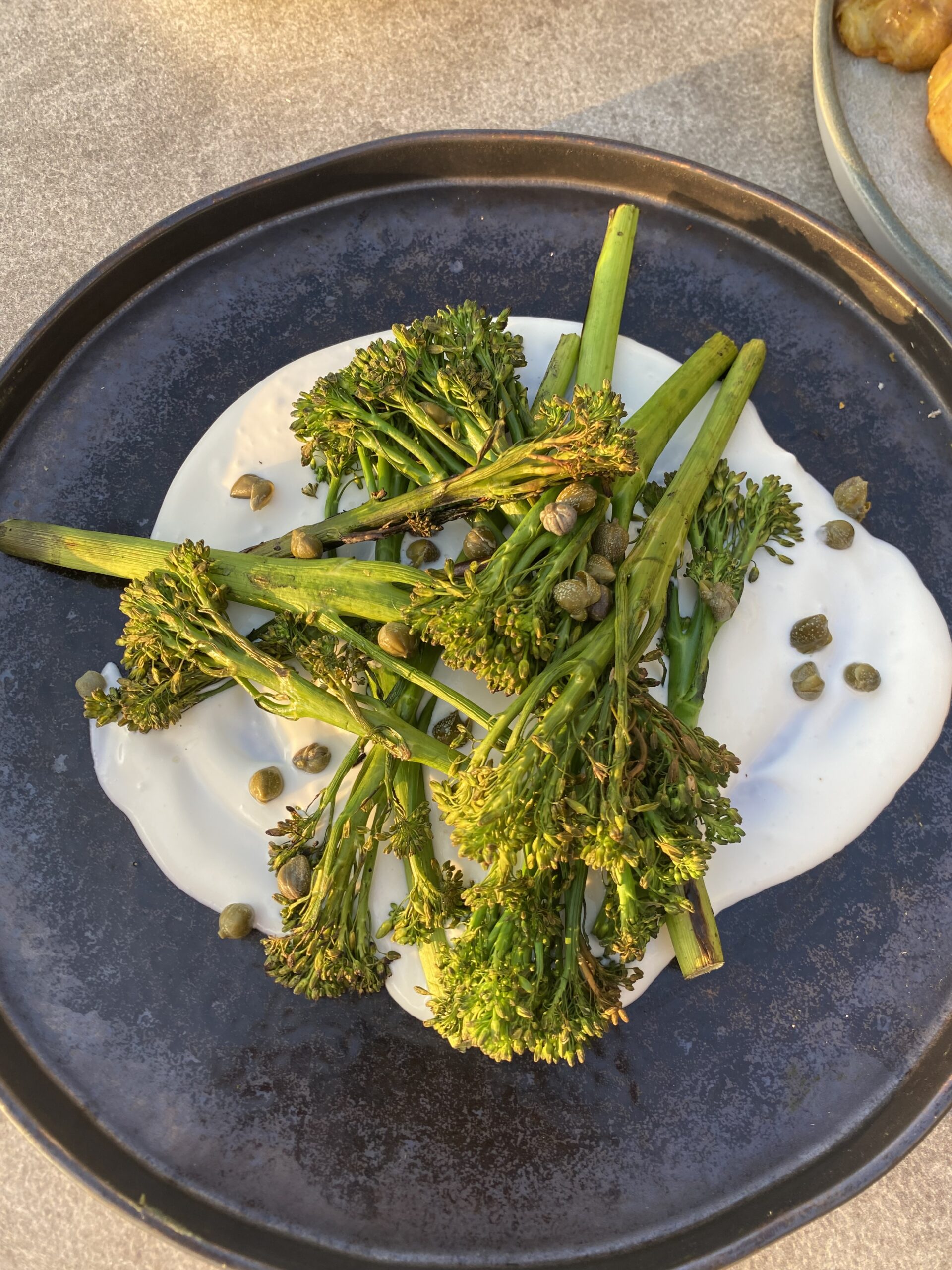 Whipped feta with charred broccoli and capers